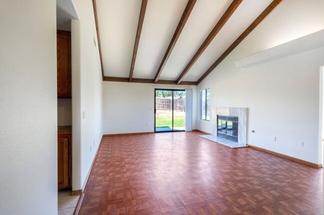 Building Photo - Corner Lot 4BR with Vaulted Ceilings & Big Yard