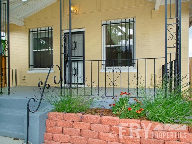 Building Photo - Classic bungalow with modern finishes in burgeoning Regis neighborhood.