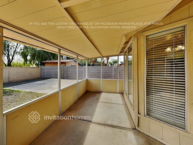 Building Photo - 9023 W Harmont Dr