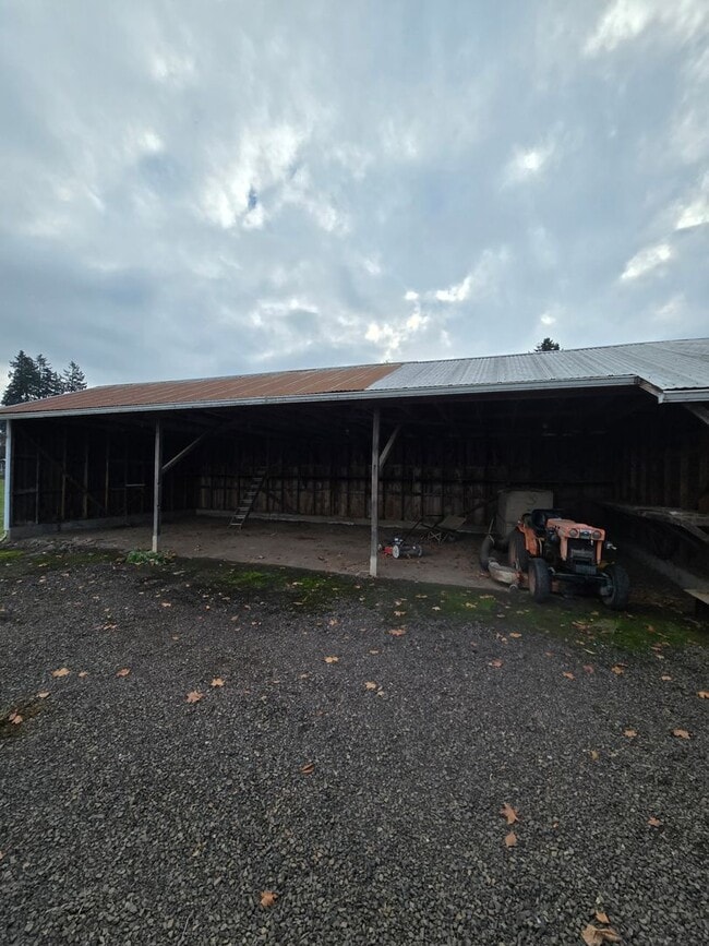 Building Photo - Pet Friendly 3 Bed / 2Bath Home with 2 Garages, Open Air Covered Storage, Large Open Yard, and more!