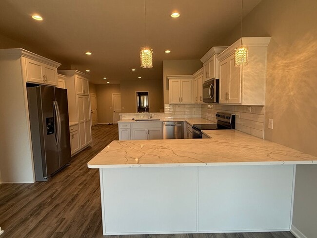 Building Photo - 2 Bedroom/2.5 Bath ranch townhome with 2 stall garage located in SE Lincoln