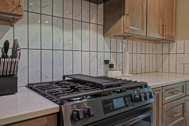 Building Photo - COMING SOON · Designer Renovation · Covered Deck Pavilion · 2-Car Garage · Lawn Care Included