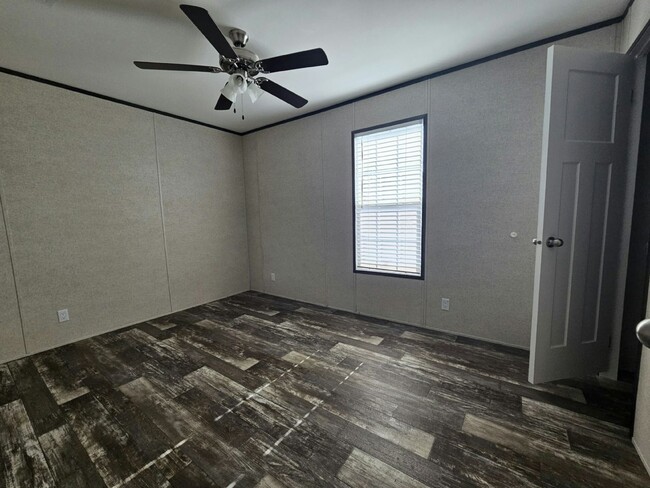Building Photo - 6631 Hidden Oaks Dr