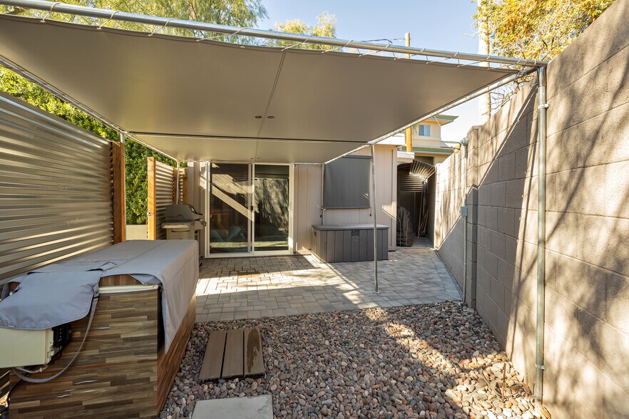 Wellness area with access to modern shed, outdoor storage, and covered bike area - 6136 N 9th St