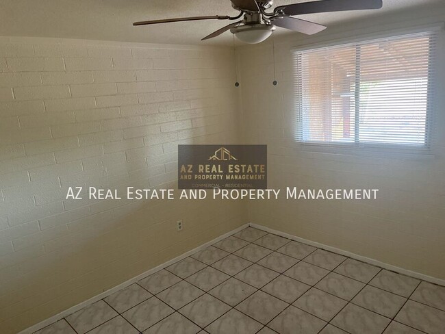 Building Photo - 3841 N 63rd Dr