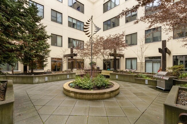 Building Photo - Chic, urban studio condo in the Pearl—Peaceful, In-unit w/d, 14-ft ceilings, deeded parking