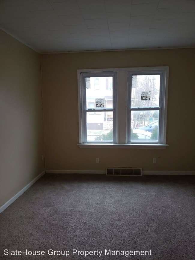 Building Photo - 3 br, 1 bath House - 1003 W 4th St EGWST