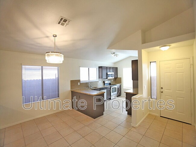 Building Photo - 8644 W Mauro Ln