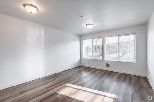 3BR, 2BA - 1,100SF - Living Room - Broadway Apartments