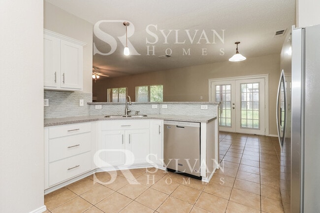 Building Photo - Turn the key. Enter. Smile. Repeat every day!