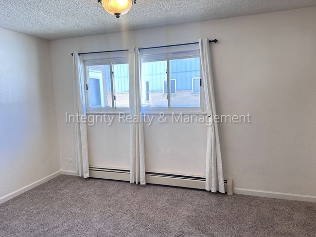 Building Photo - 7309 W Hampden Ave