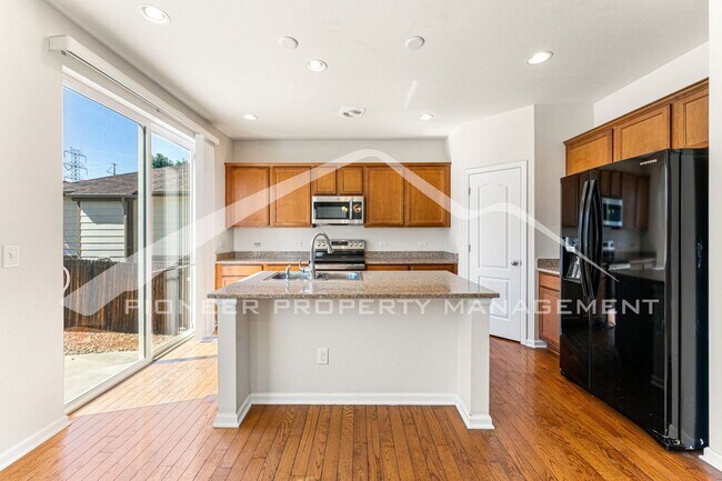 Building Photo - Spacious Home with Fenced Yard and Central AC