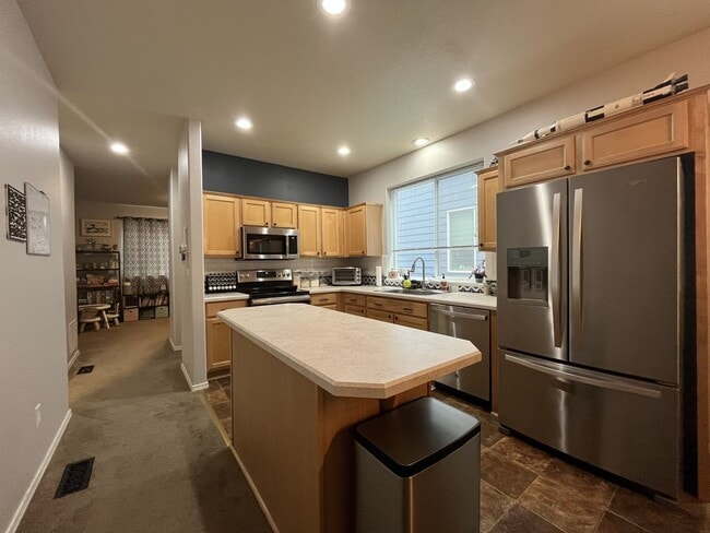 Building Photo - Modern 2 Bedroom + Bonus Room Townhome Near Nike with Dual En Suites, Balcony & Attached Garage