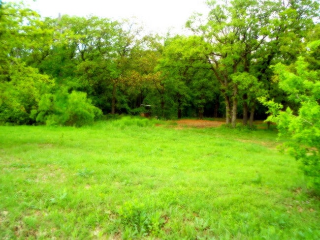 Building Photo - Cute and Cozy Country Charmer on 1 Acre wi...