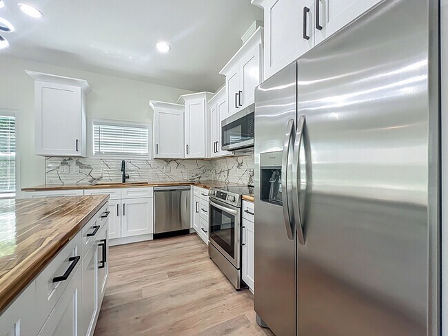 Building Photo - BRAND NEW CONSTRUCTION in the Heart of Pla...
