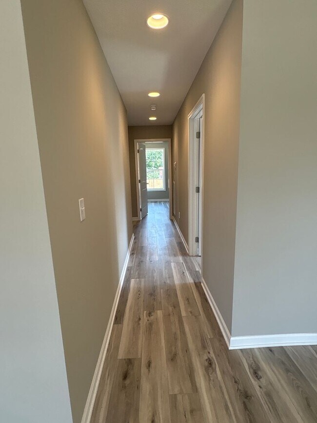 Building Photo - Charming New Home with a Rocking Chair Front Porch!