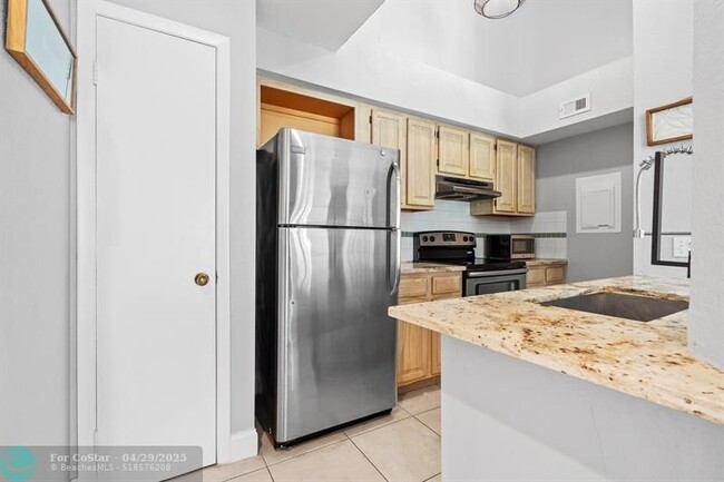 Building Photo - 1705 Palm Cove Blvd