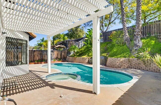 Building Photo - Stunning Upgraded 4BR Home with Pool in Desirable Rancho San Diego – Move-In Ready