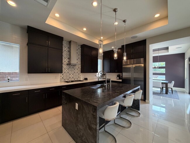 Building Photo - 4 Bed, 4.5 Bath Summerlin Home in The Ridges with Resort-Style Backyard