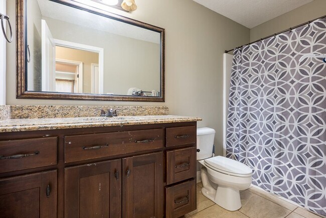 Building Photo - POOL - Elegant 4-Bedroom Home with Fenced Yard