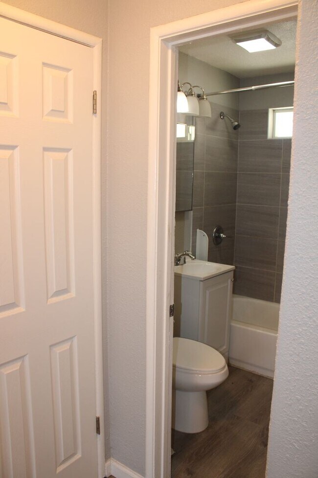Building Photo - Two Bedroom plus BONUS Room in Pittsburg Single Story Four-plex- OPTIONAL DETACHED GARAGE AVAILABLE!