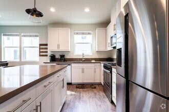Building Photo - Upgraded everything, solar, beautiful beac...