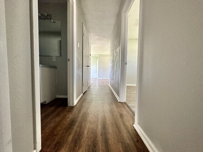 Building Photo - Updated Home with Gorgeous Floors & Large Backyard