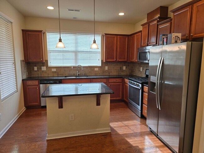 Building Photo - Classic & Comfortable West Durham Townhome with Timeless Design