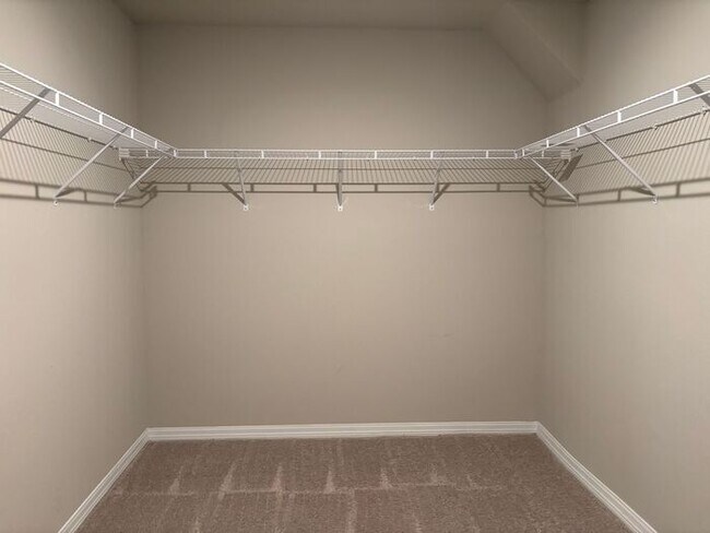 Building Photo - Like-New 4 Bedroom 3 Bath with Pond View & Two Living Spaces — Minutes to South Lake Nona
