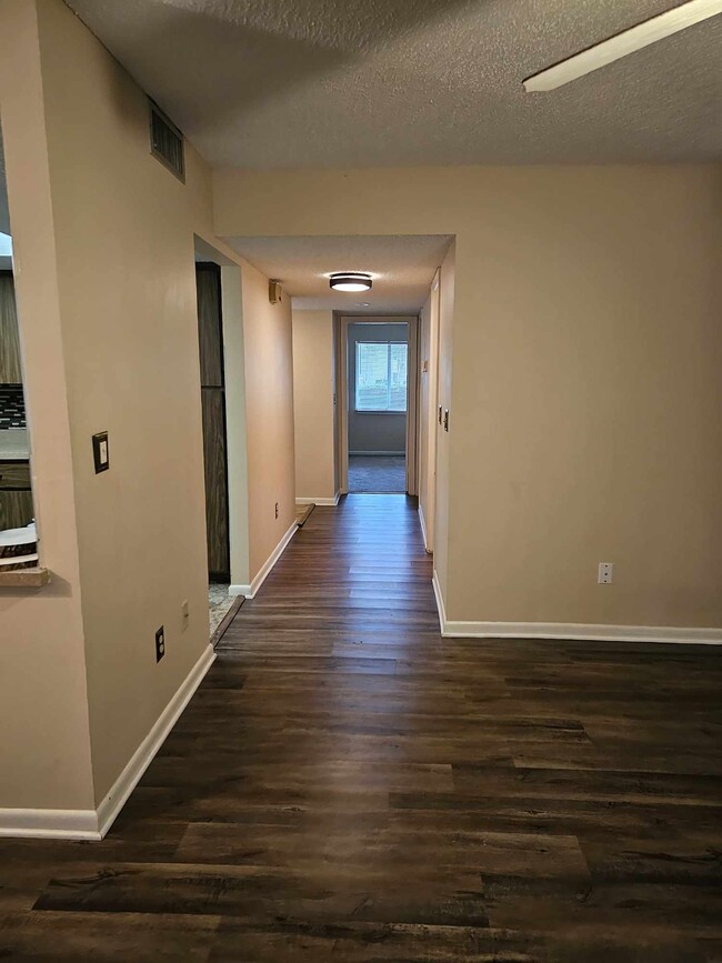 Hallway, nice wood flooring - 589 Fairways Cir