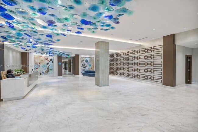 Building Photo - 10155 Collins Ave