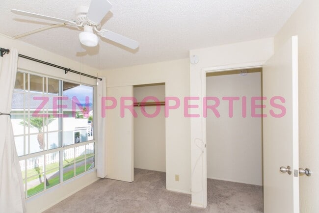 Building Photo - a 2 bdrm, 2 bath townhome  with 1 prkg at ...