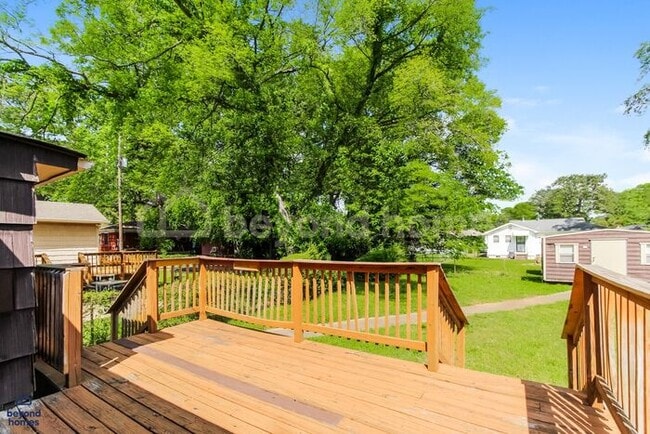 Building Photo - Updated Bungalow with Massive Deck and Fully Fenced Yard!