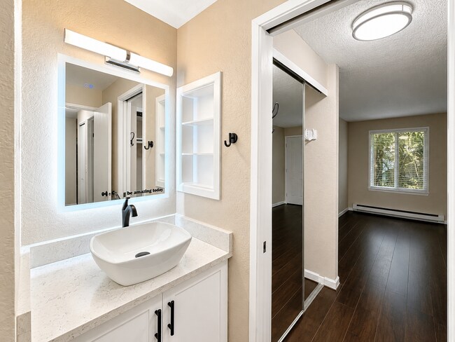 Building Photo - Modern Wooded Condo with Upgraded Kitchen & Private Deck