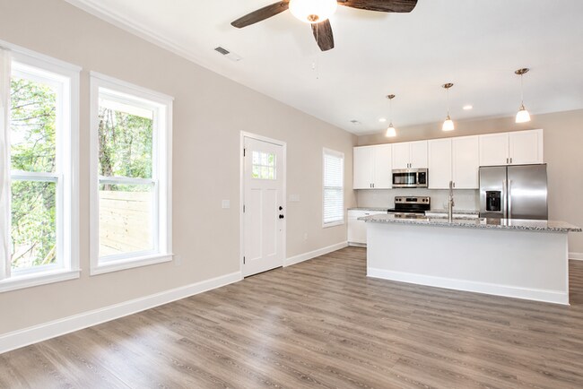 Building Photo - Spacious Three Bedroom w/ Loft Space