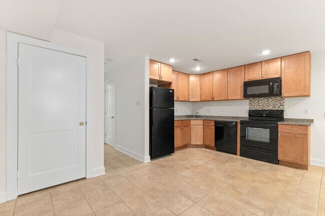 Building Photo - Charming One-Bedroom Basement Apartment