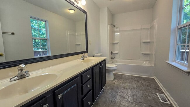 Building Photo - 5607 Whispering Pines Dr