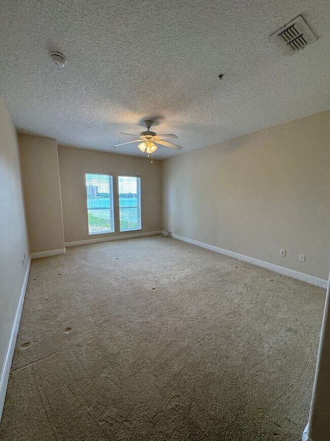 Building Photo - MOVE IN SPECIAL - CONDO LOCATE IN GATED COMMUNITY  IN DR. PHILLIPS-TOSCANA