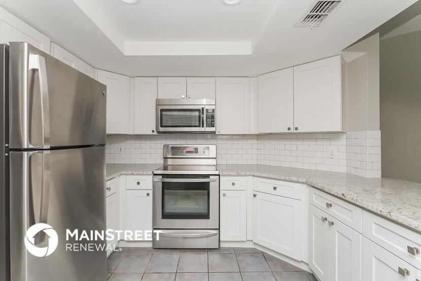 Building Photo - 8055 Wooden Dr