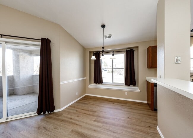 Building Photo - 3 Bed Top Floor Condo near Ft. Carson in Gated Community with detached Garage