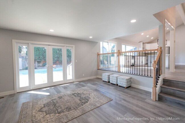 Building Photo - Spacious custom 4 bedroom home with pool and 2 car garage!