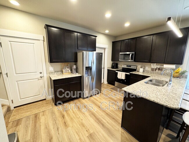 Building Photo - 6755 Carriage Meadows Dr