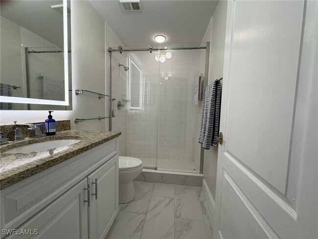 Building Photo - 7040 Pelican Bay Blvd