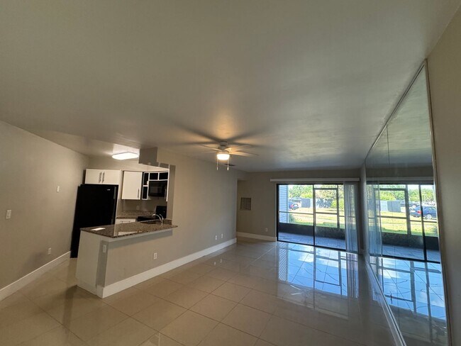 Building Photo - Experience comfort & leisure in this charming condo nestled within Orlando's best-kept secret, Ve...