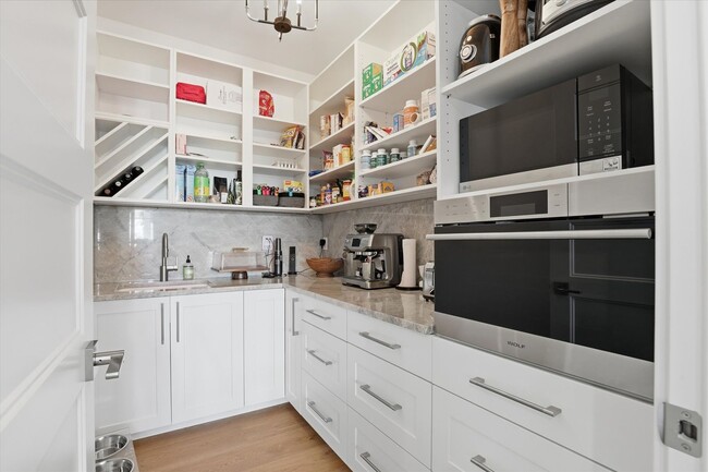 Building Photo - Modern 5-Bed Home in Atlas Waterfront — Elevator, Luxury Finishes & Prime Location