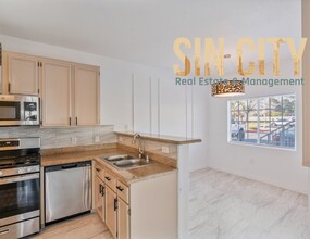 Building Photo - Spacious 3-Bedroom Condo Retreat with 2 Full Baths in Prime Las Vegas Location!