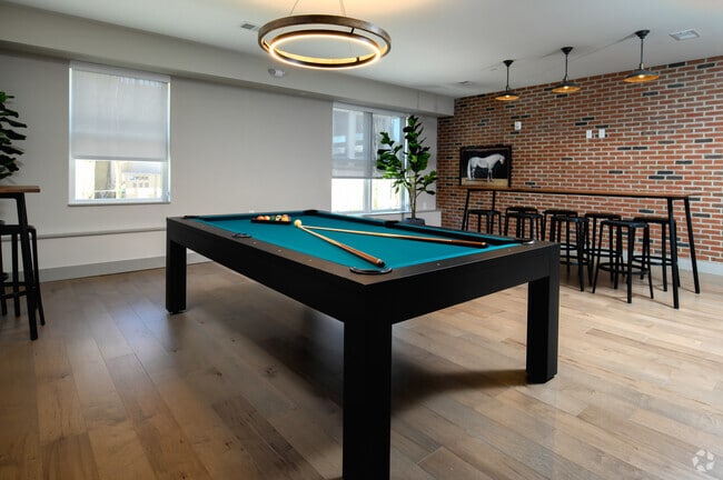 Comfort Room with Pool Table - The Fritz Apartments
