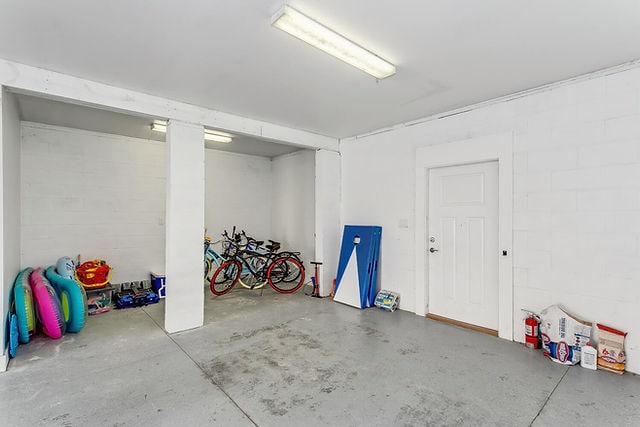 Deep Garage with Bikes, Floats and Corn Hole Boards - 14581 Salt Meadow Dr