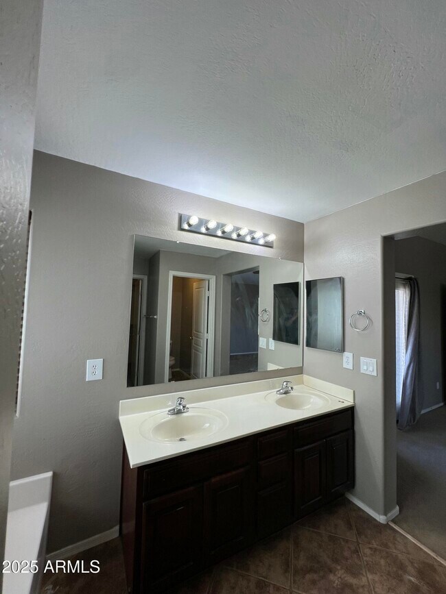 Building Photo - 14711 W Riviera Dr