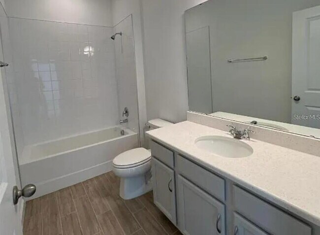 Building Photo - Spacious & Modern 4-Bed Home in Hartwood Landing – Minutes from Orlando!